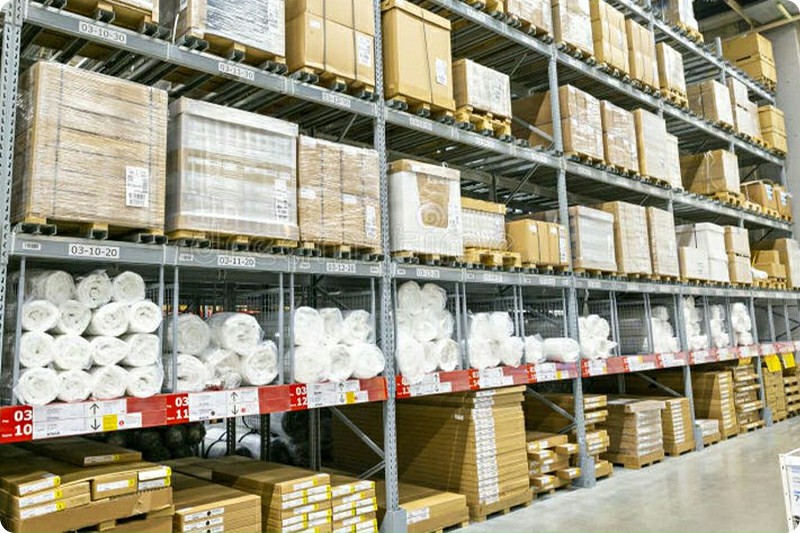 Packaged commercial goods and cartons in a distribution warehouse