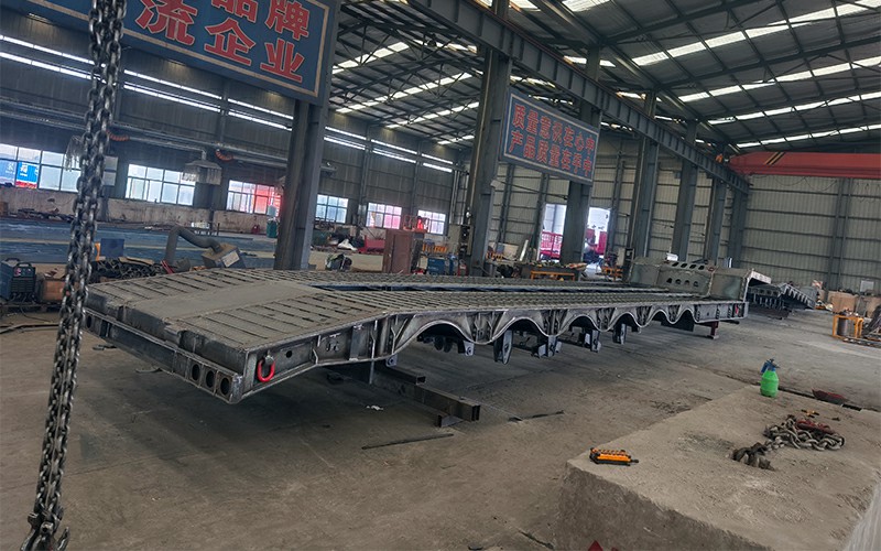 Semi trailer chassis beams and structural components